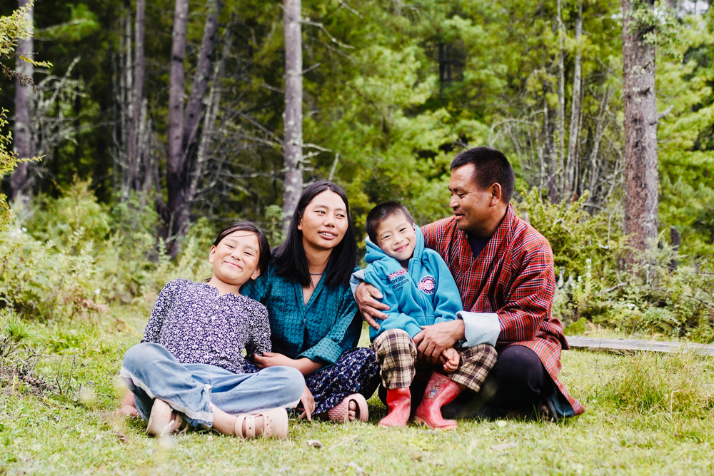 Farmer Pop and Kuenza with their family